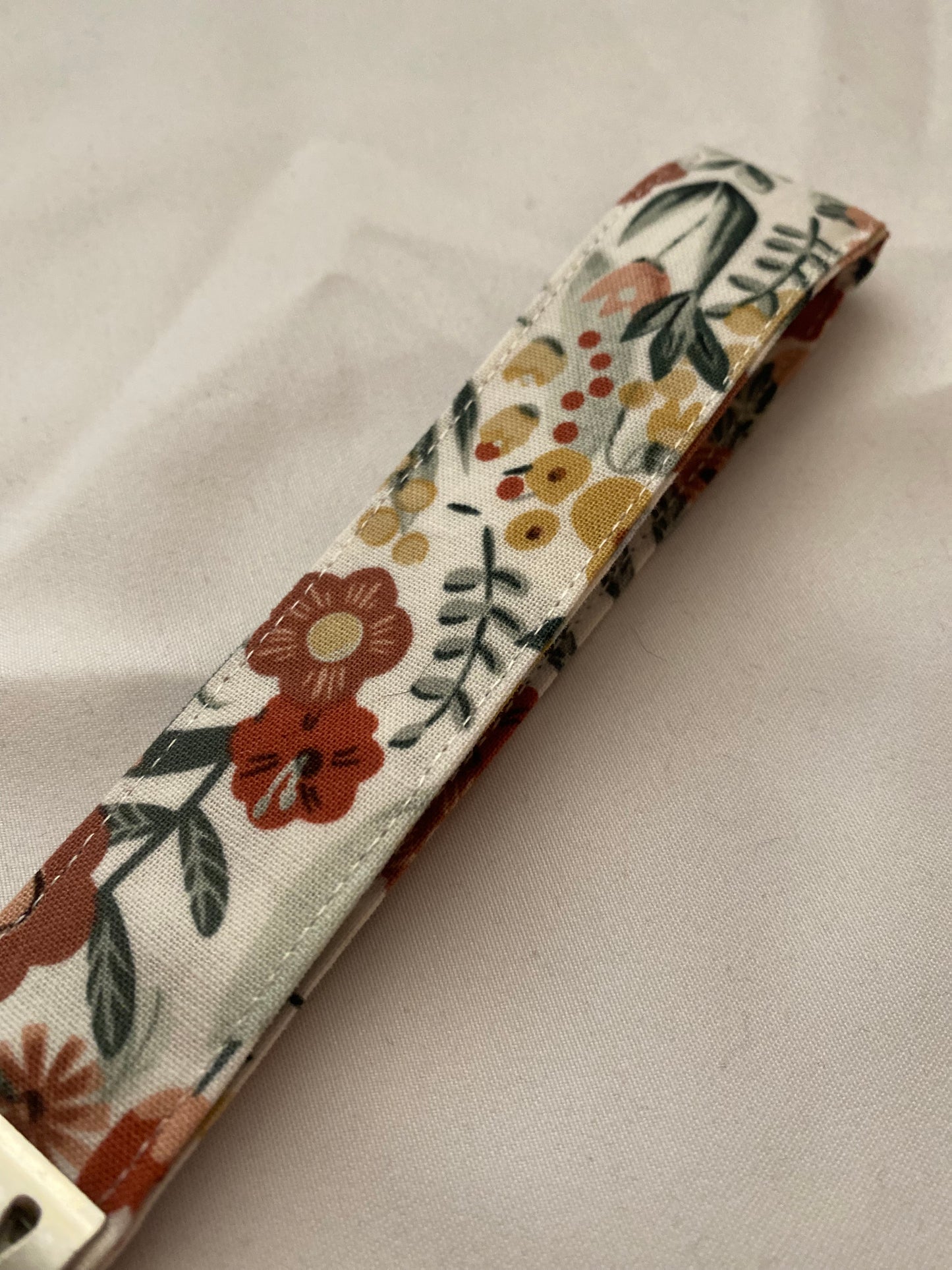 Moody Floral Wristlet